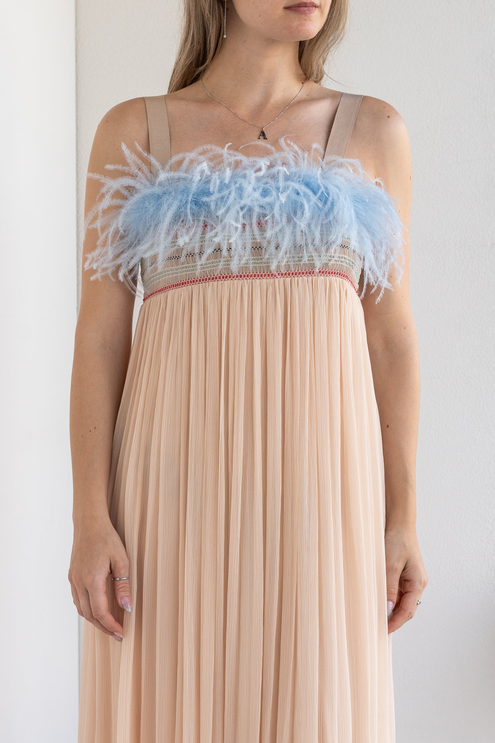 Long dress with feathers