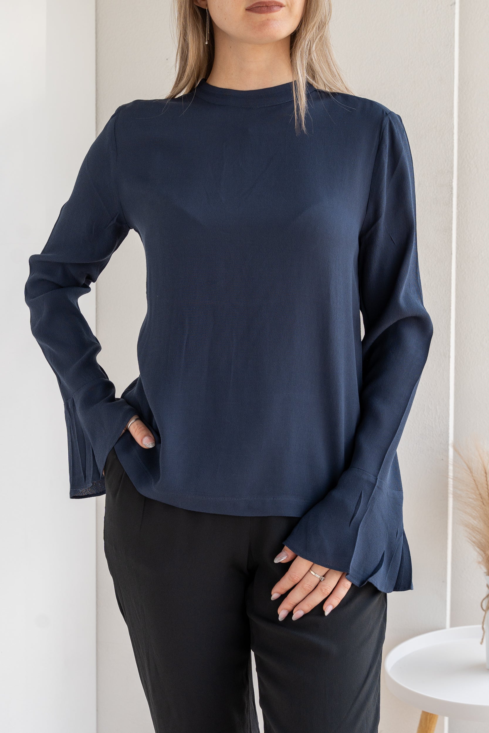 Blusa con polsino ampio