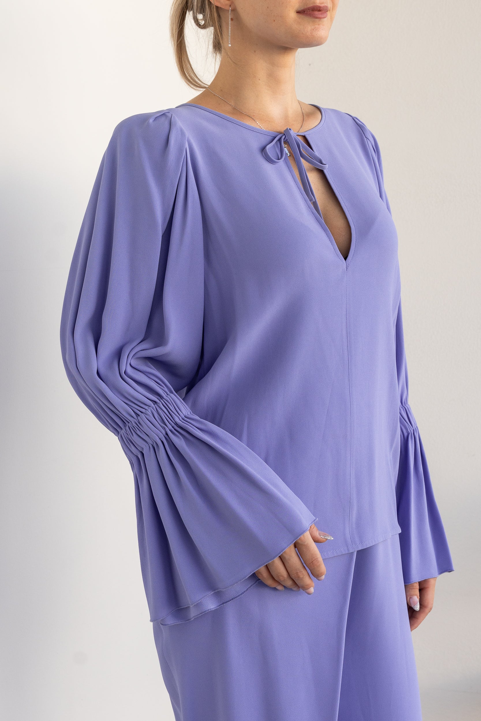 Blusa manica ampia