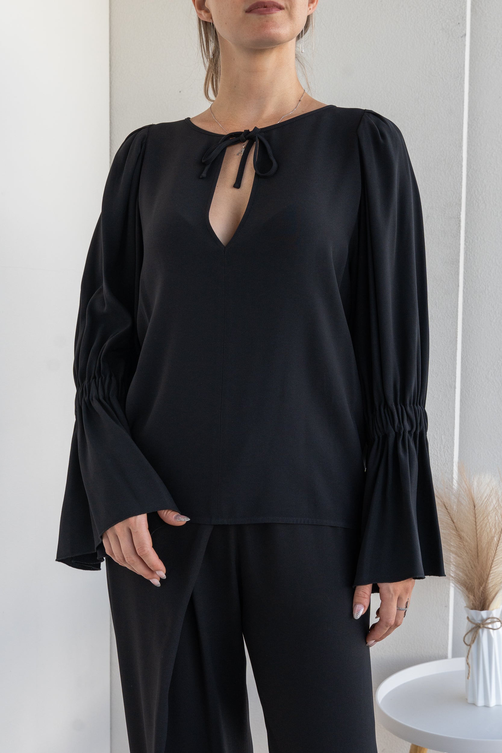 Blusa manica ampia