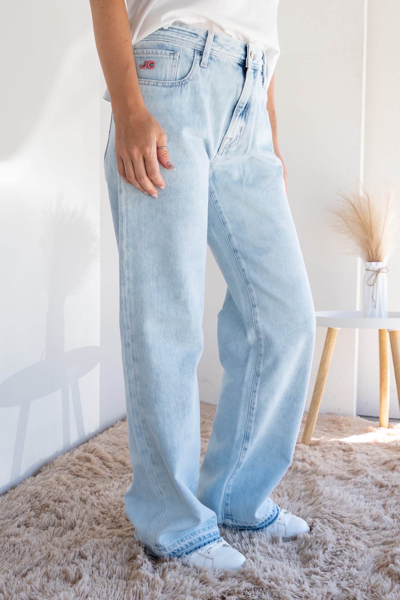 Jeans con ricami