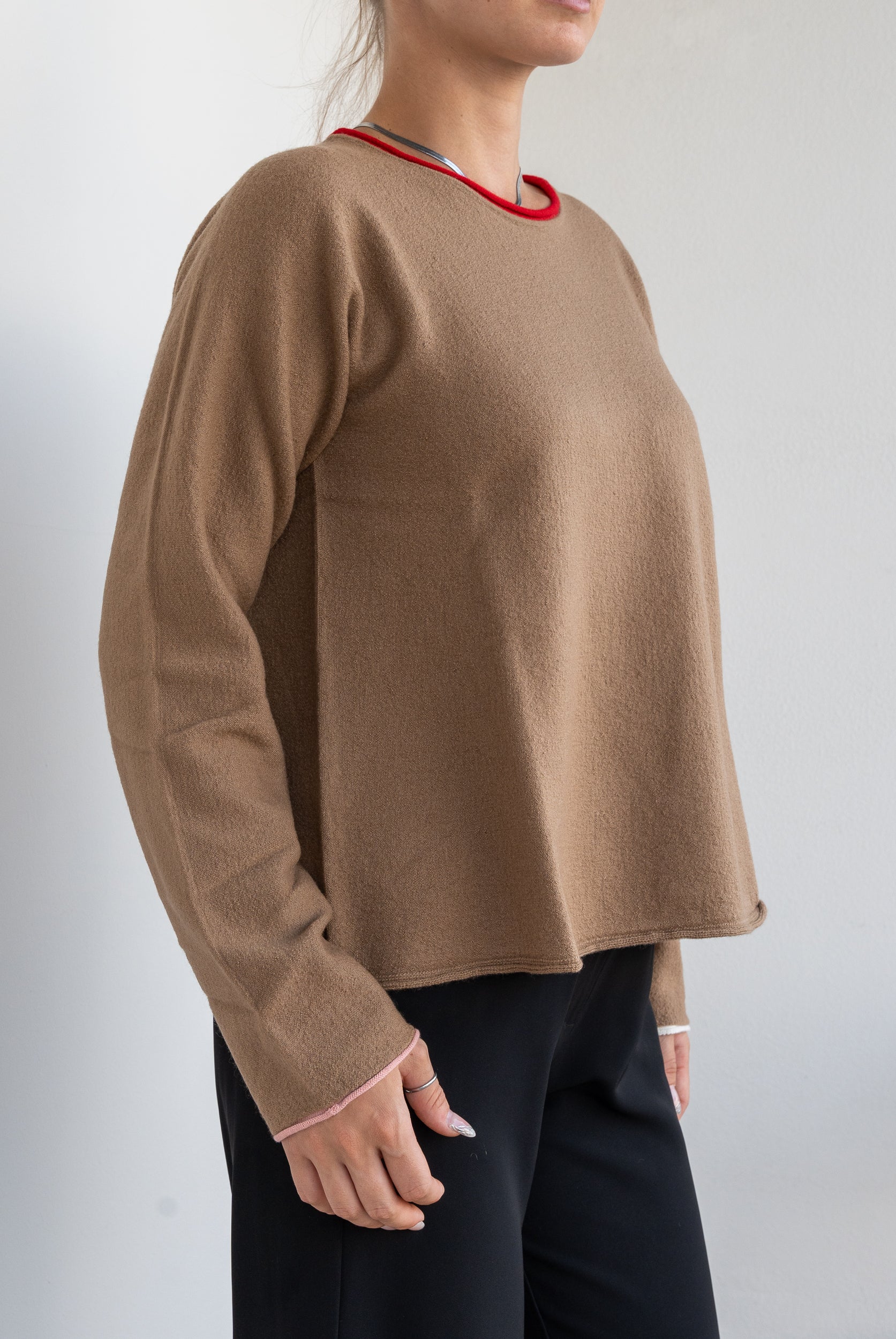 Sweater with contrasting edges