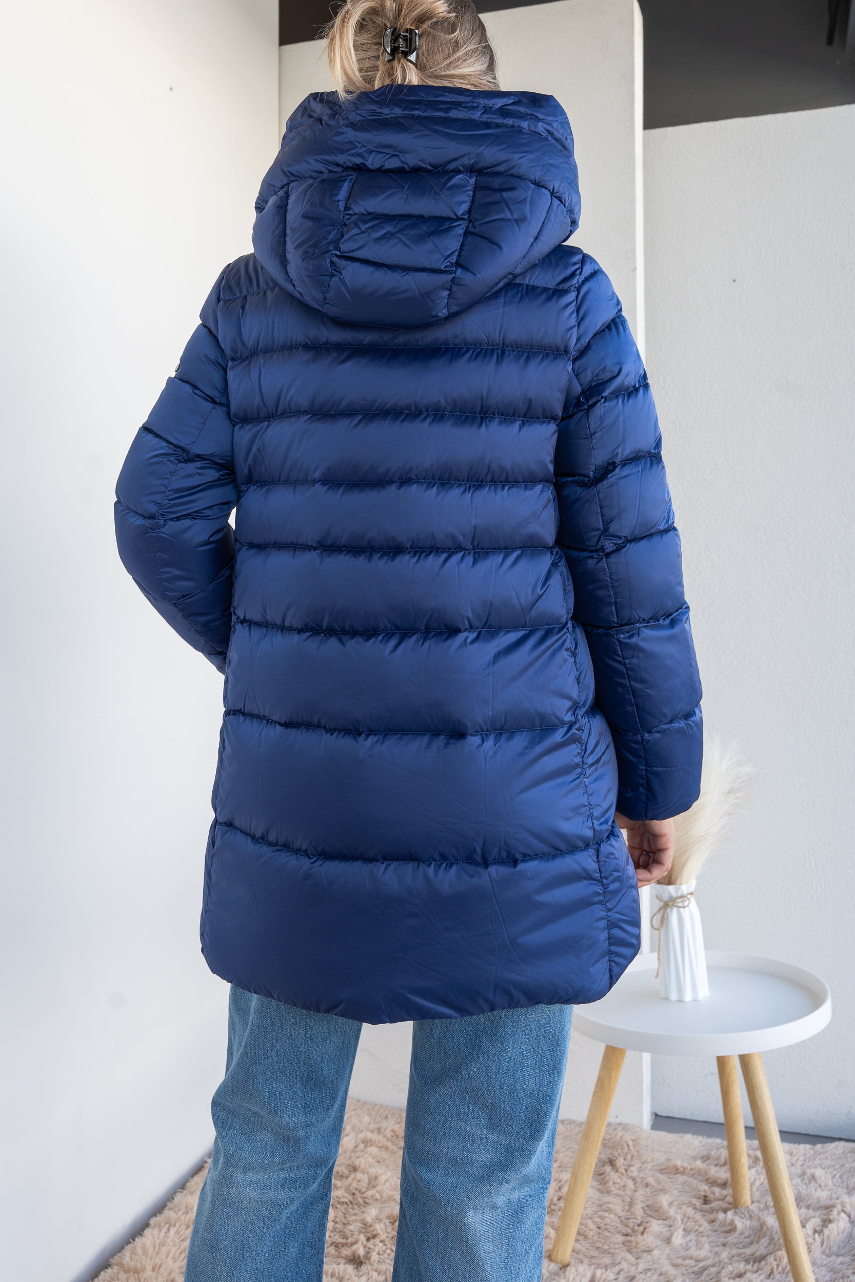 Down jacket with suspenders