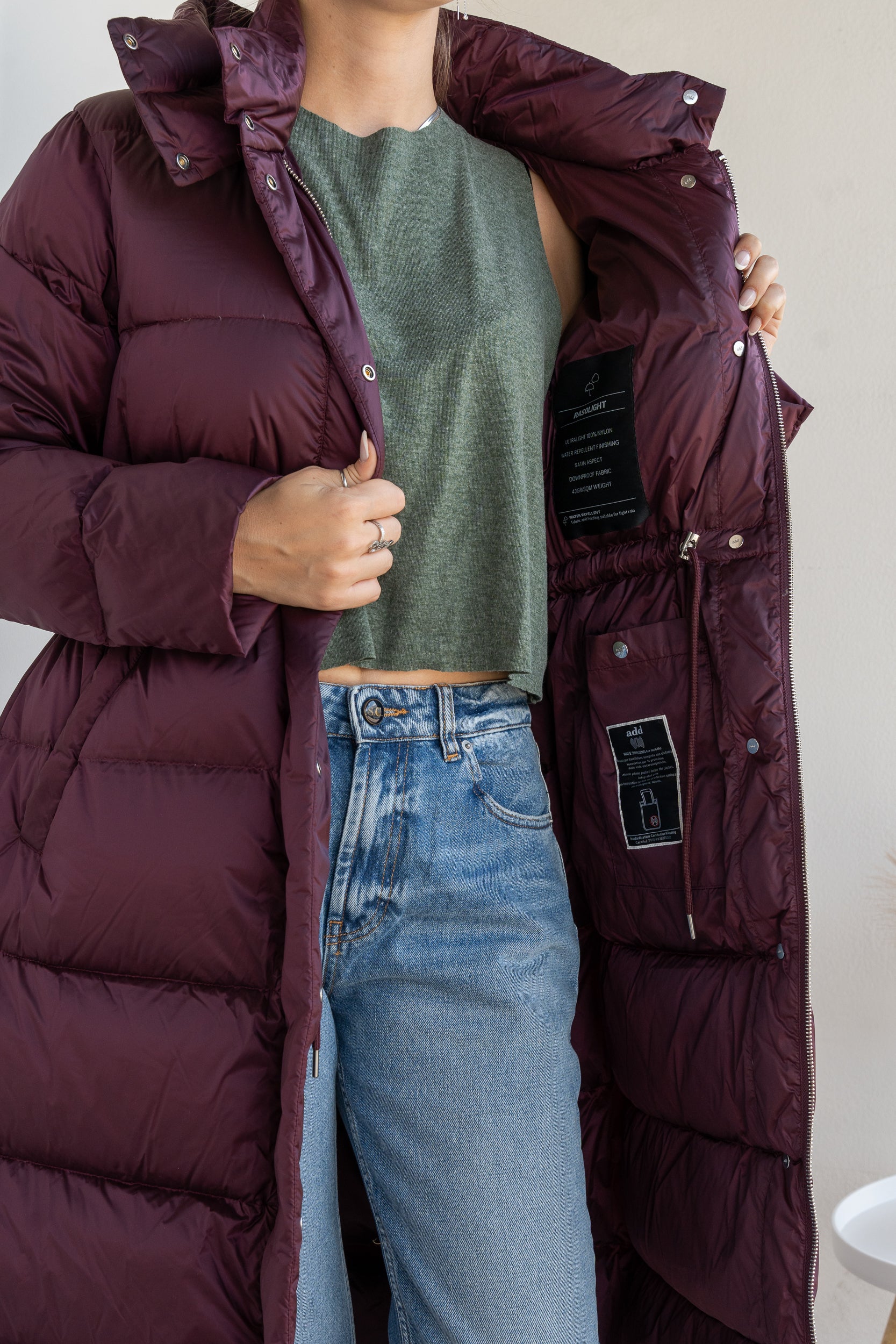 Long down jacket with suspenders