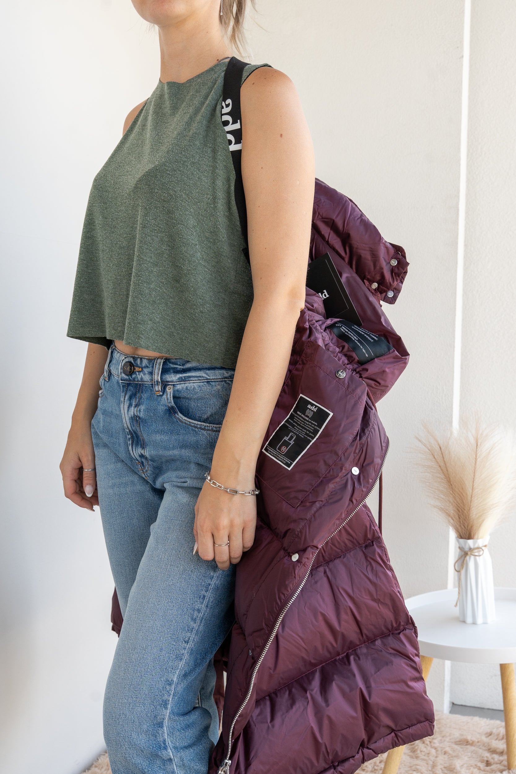 Long down jacket with suspenders