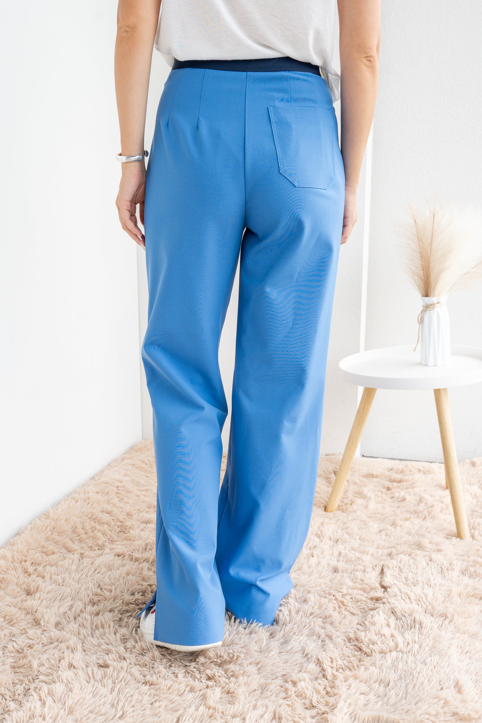 Trousers with elastic