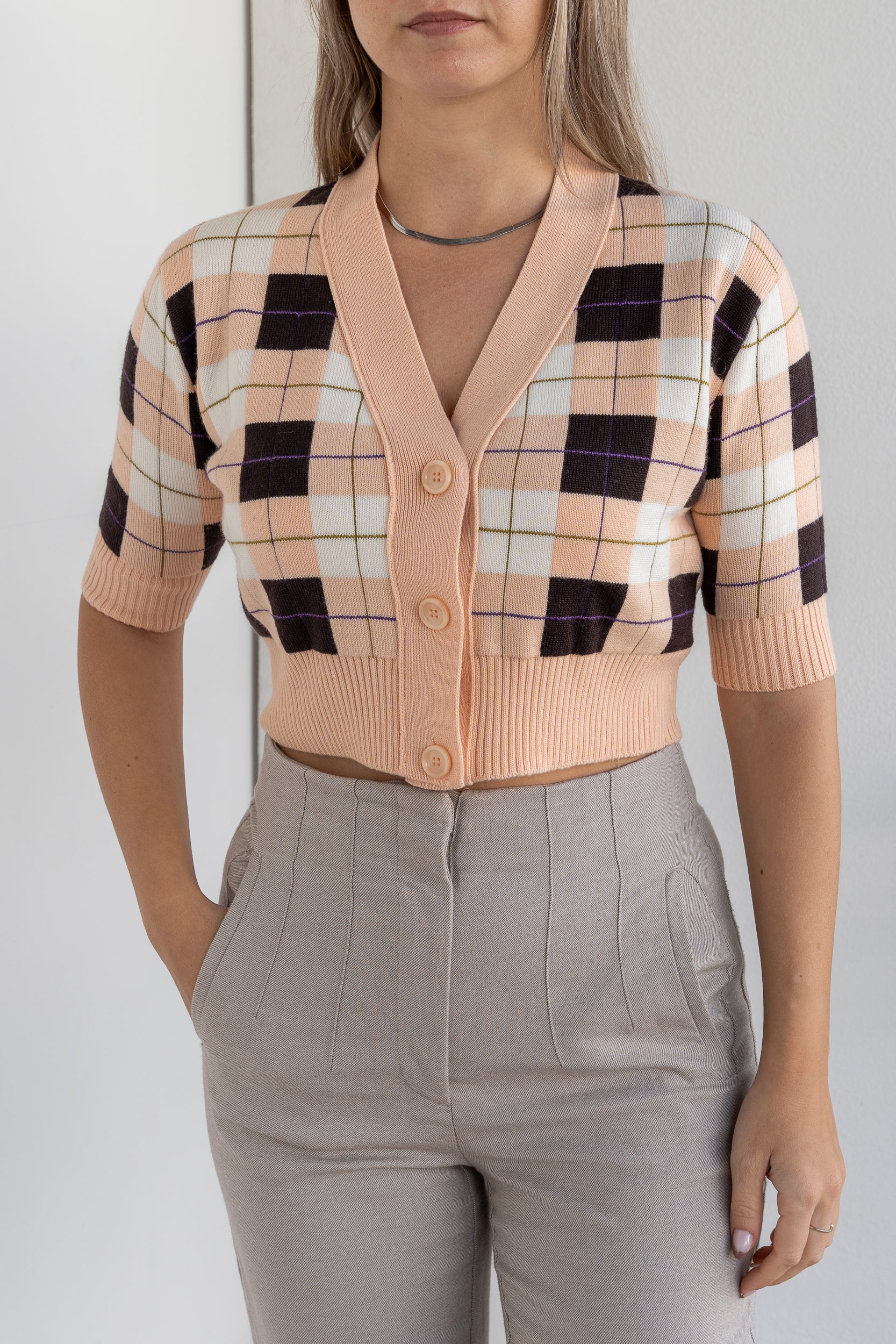 Cardigan cropped in maglia