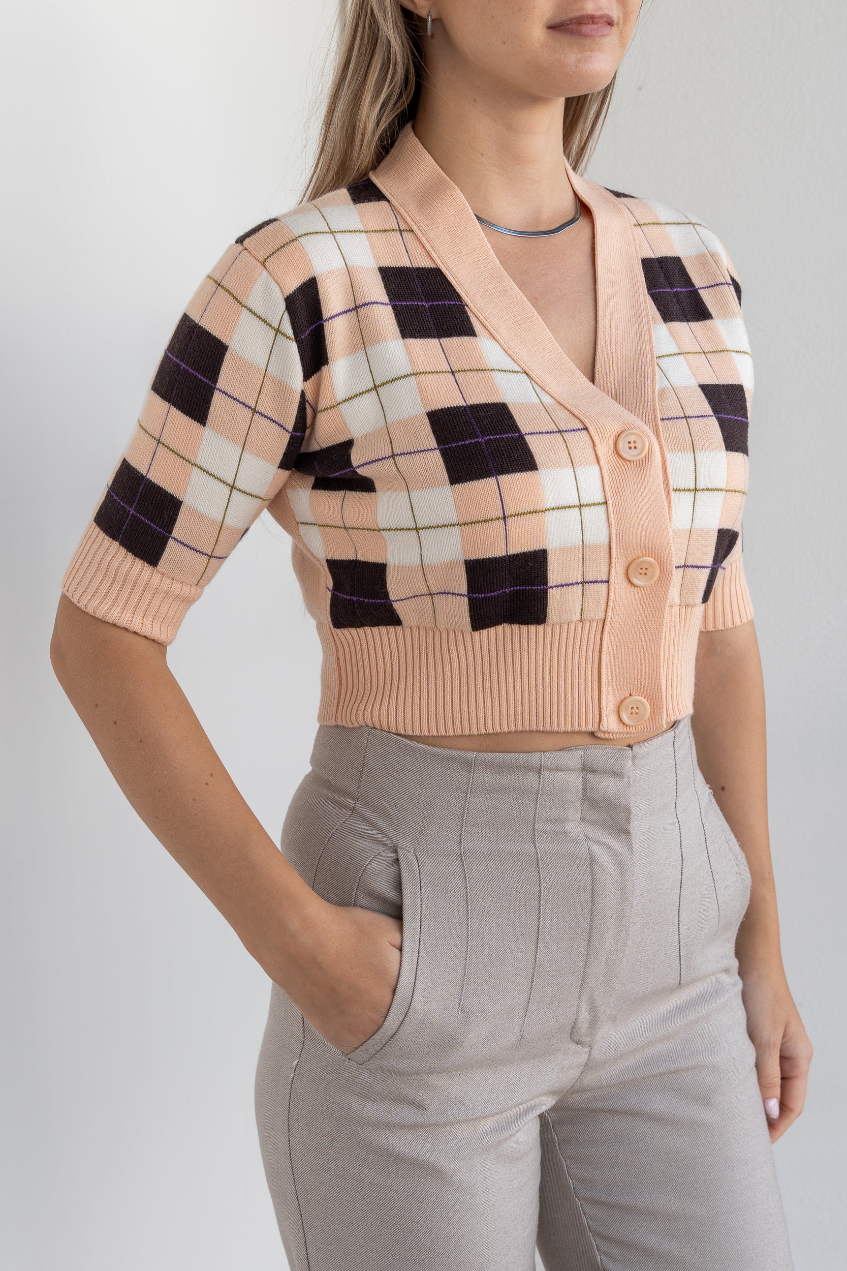Cardigan cropped in maglia