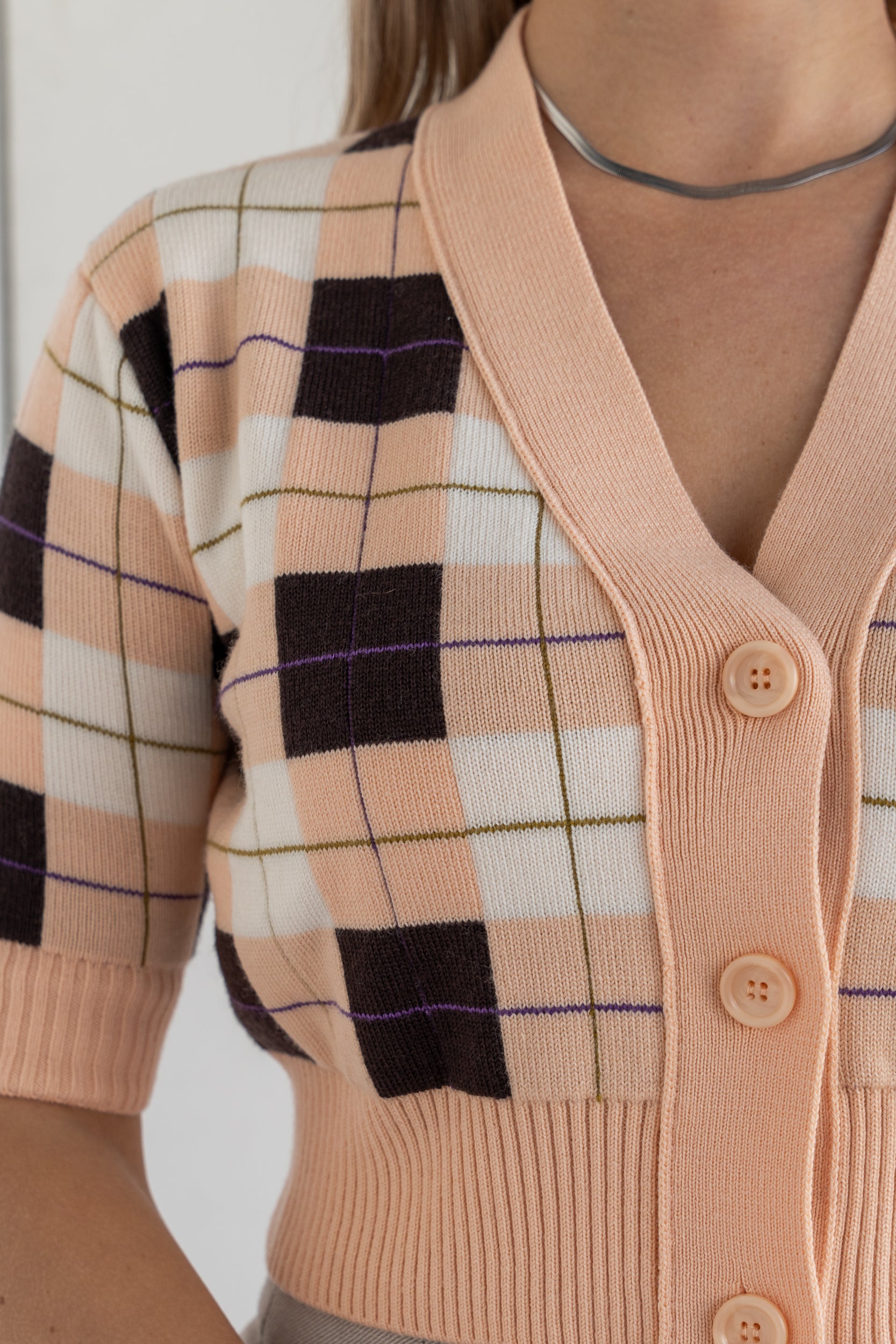 Cardigan cropped in maglia