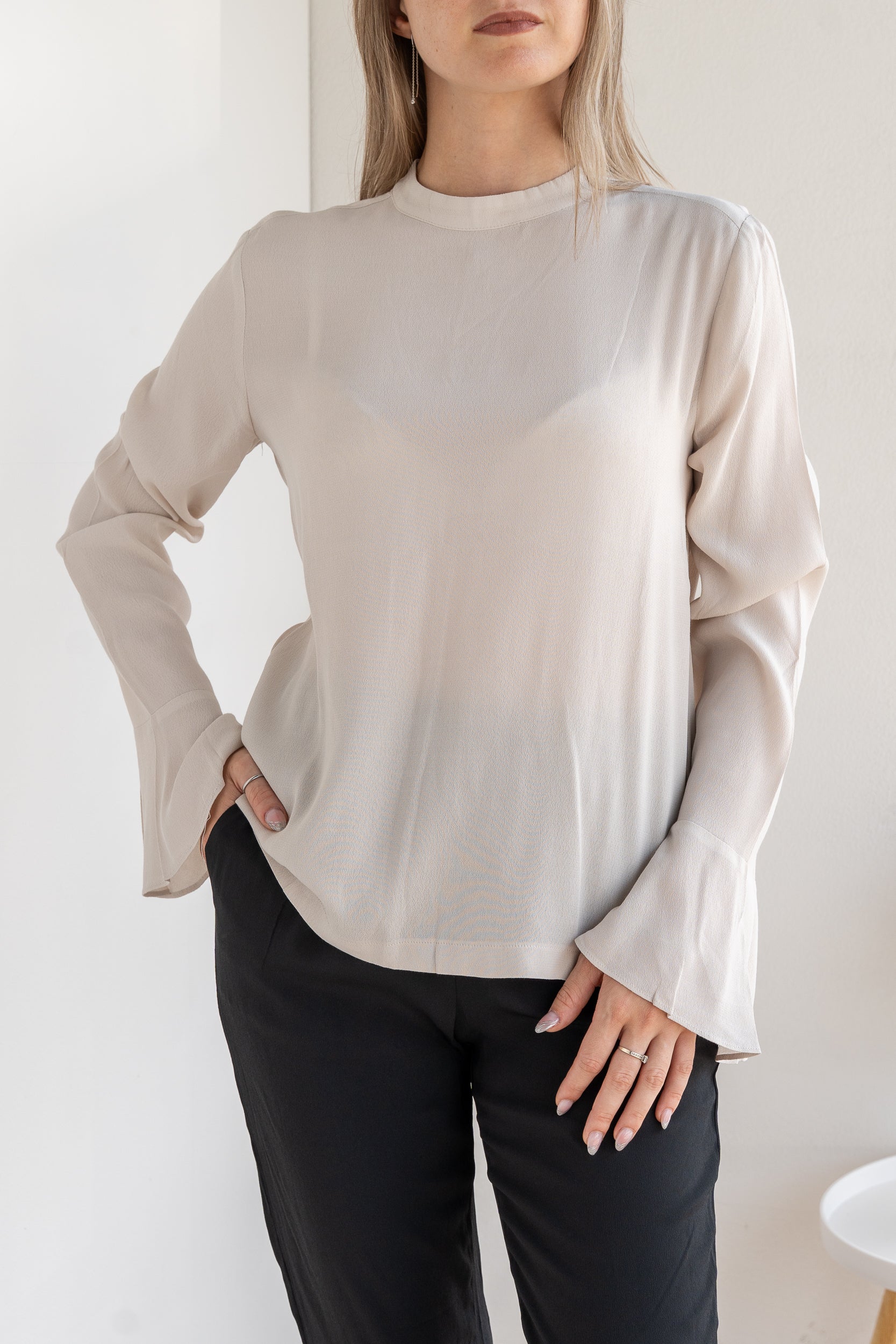 Blusa con polsino ampio