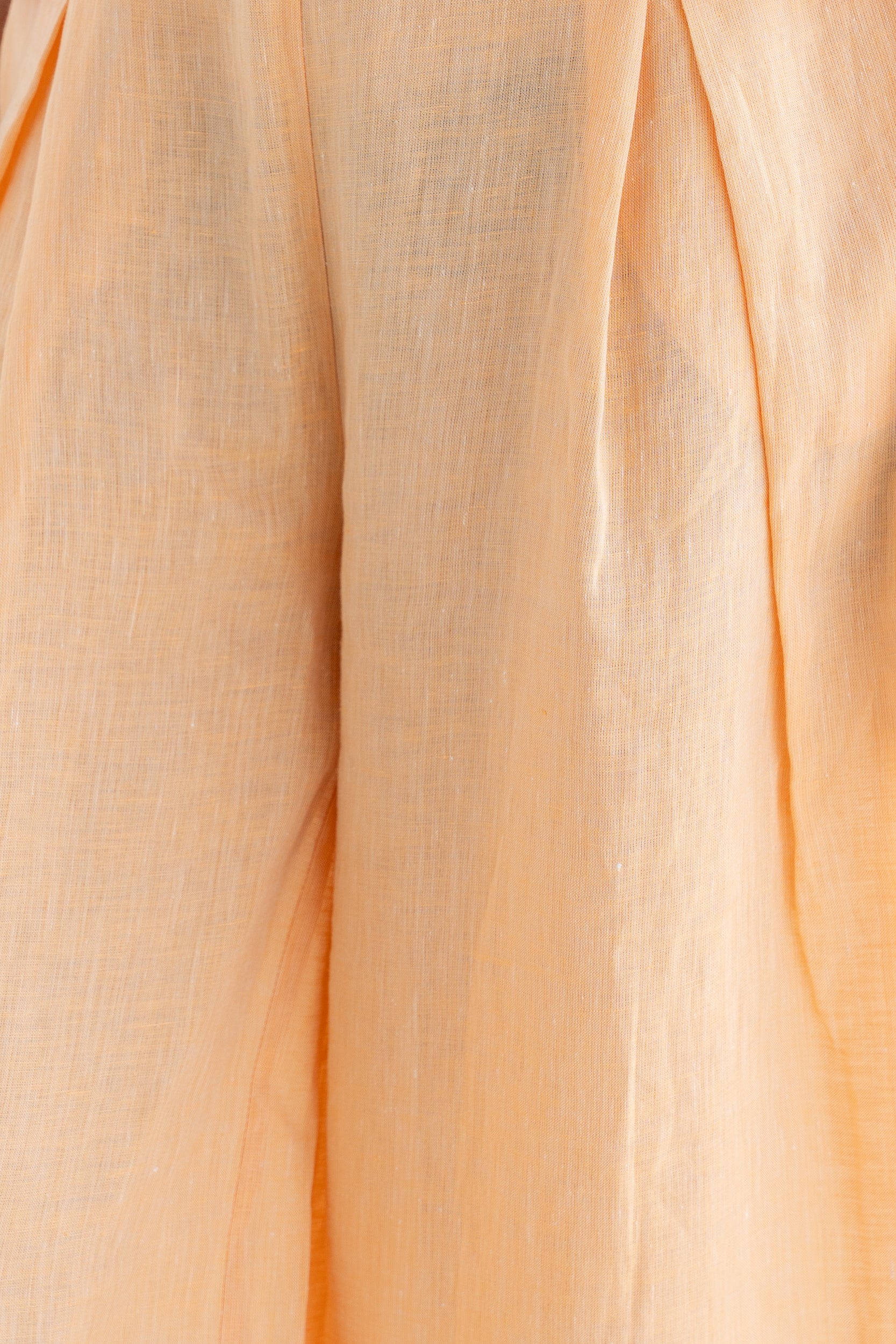Wide trousers with pleats