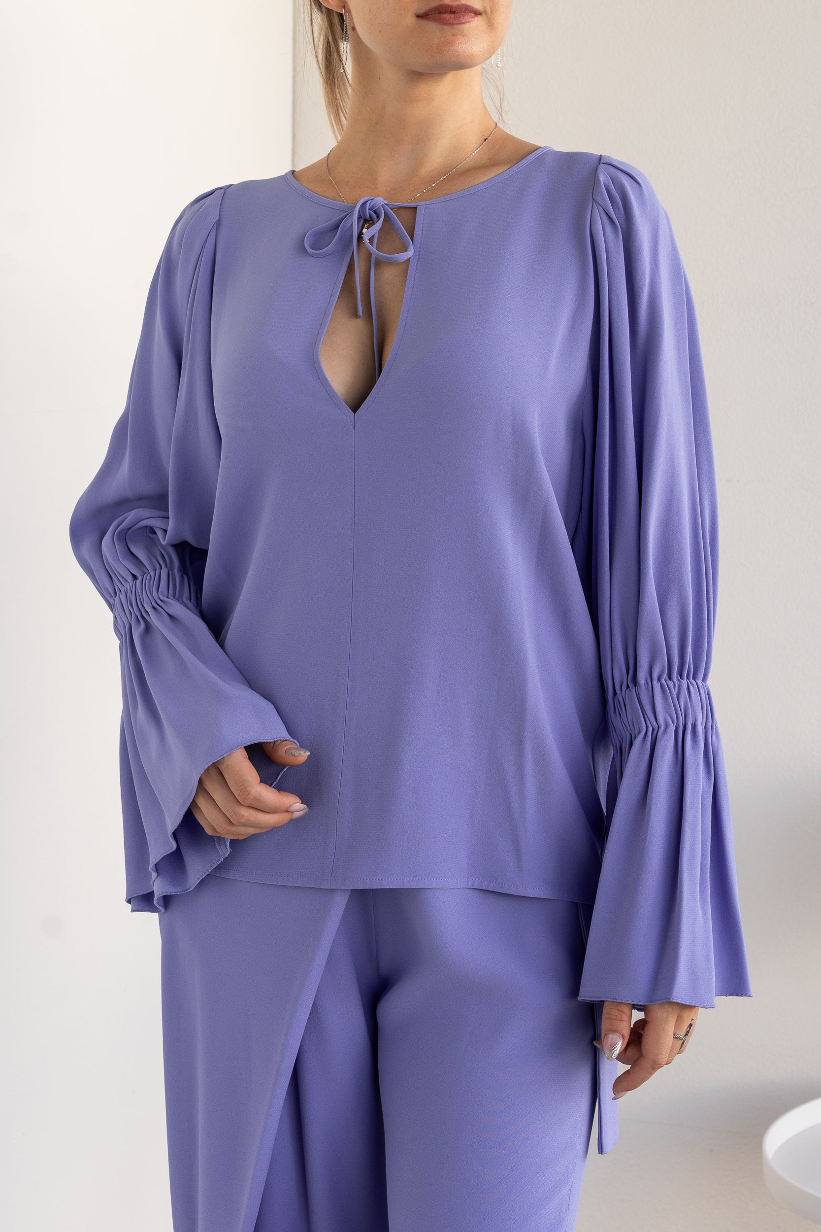 Blusa manica ampia