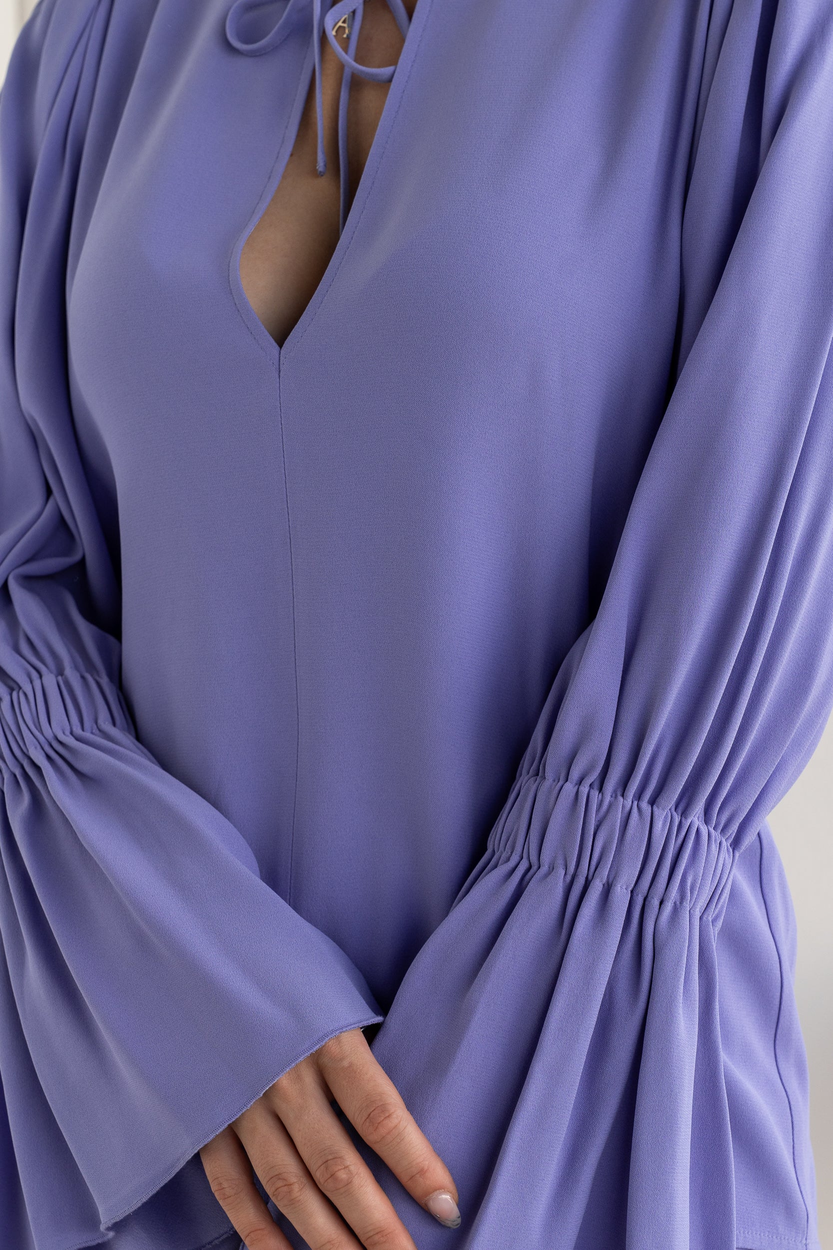Blusa manica ampia