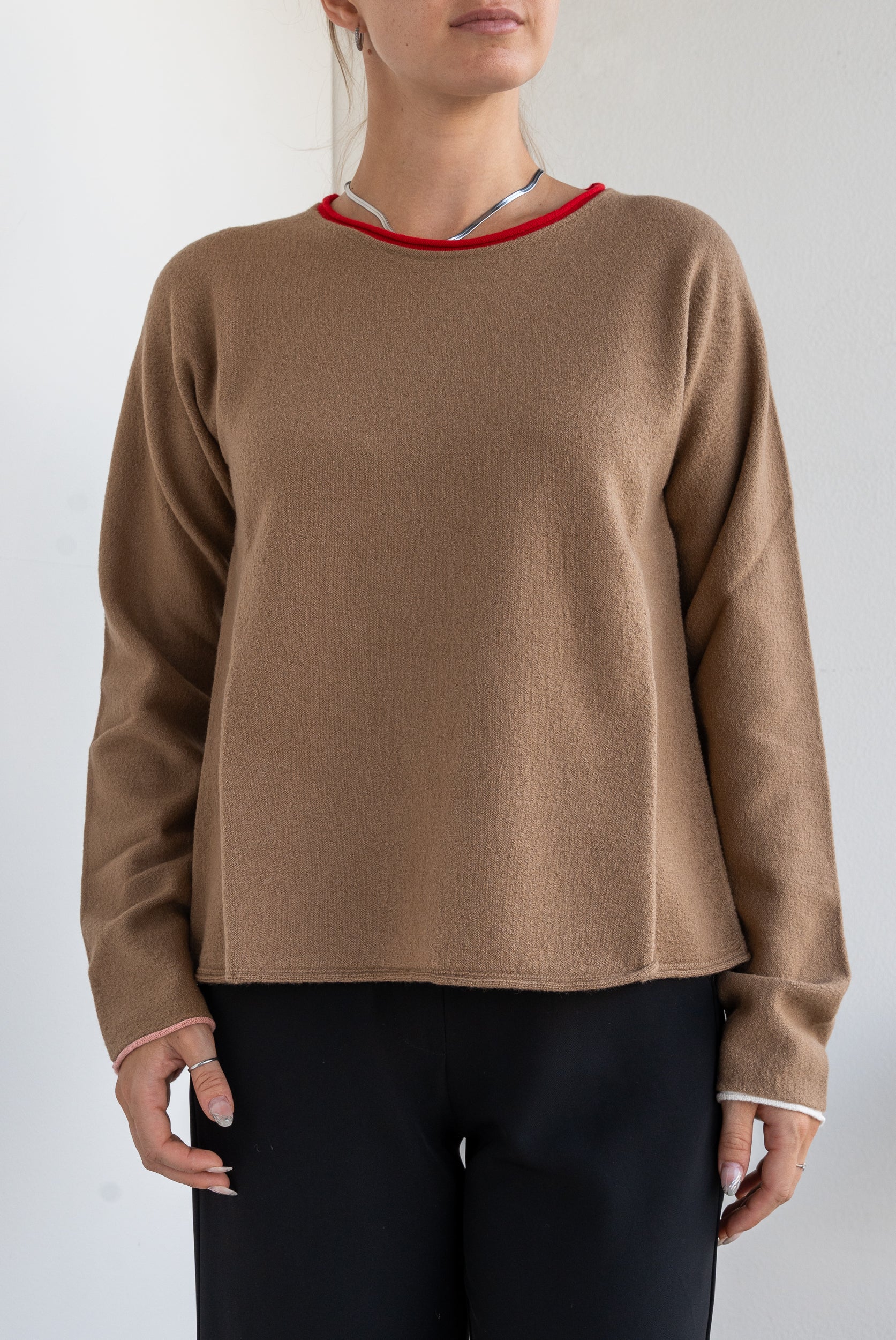 Sweater with contrasting edges