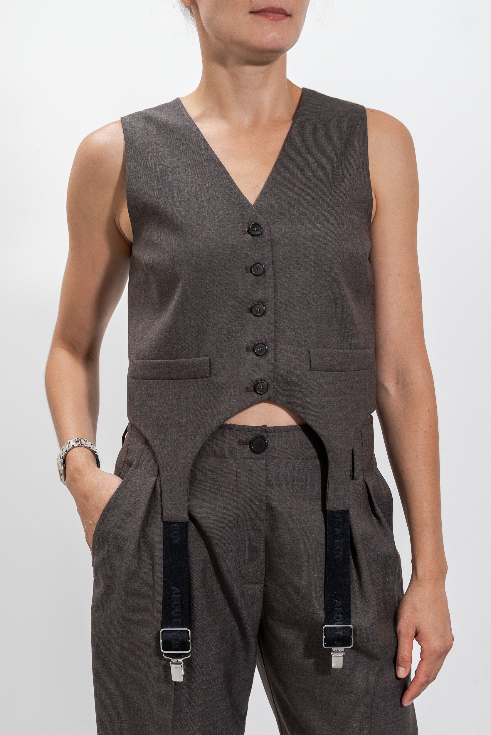 Vest with suspenders