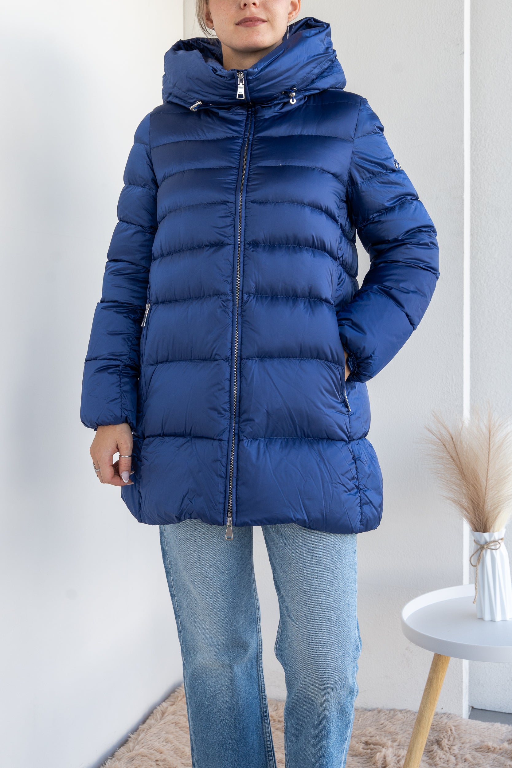 Down jacket with suspenders