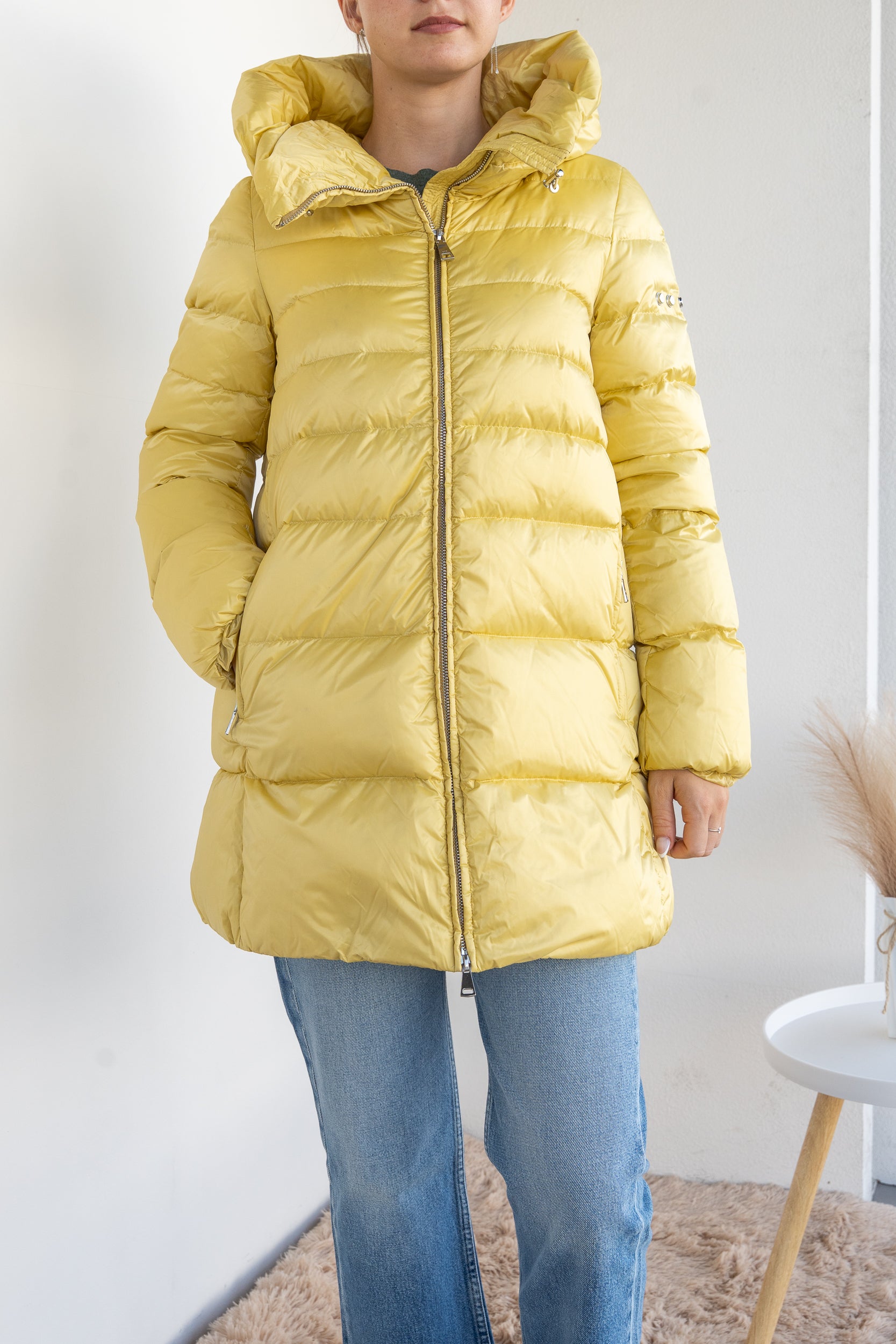 Down jacket with suspenders