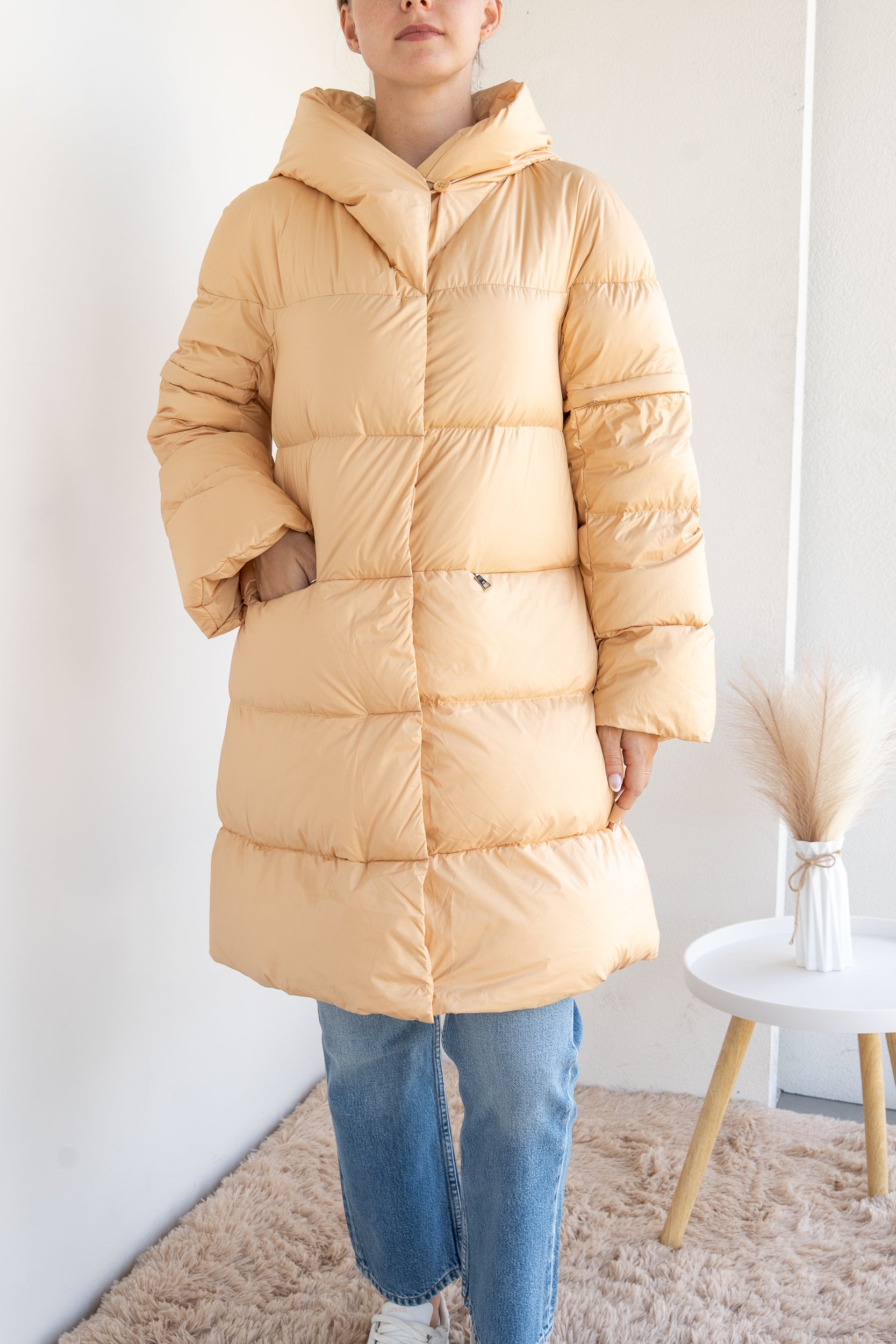 Down jacket with removable sleeves