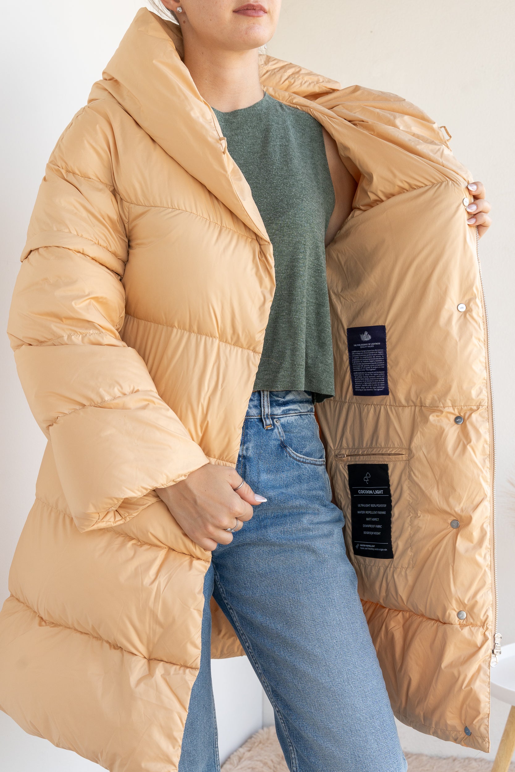Down jacket with removable sleeves
